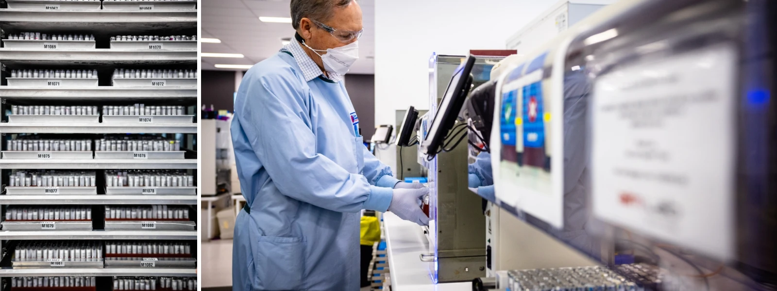 A lab worker in protective gear handles samples next to shelves filled with vials and laboratory equipment in a clinical lab setting.